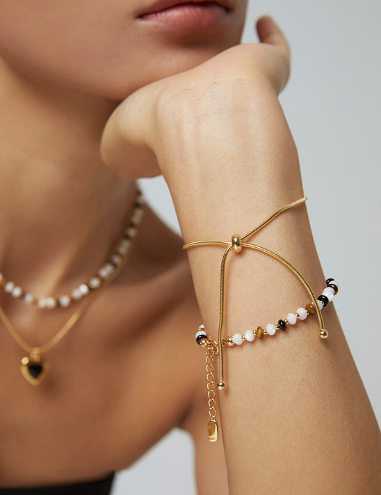 Elevate your wrist game with our stunning Bracelet collection. From lustrous pearl bracelets to chic silver, dazzling gold-plated, and gemstone-adorned beauties, find the perfect wrist adornment to express your style.