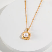 Molten Cube Pearl Pendant Necklace