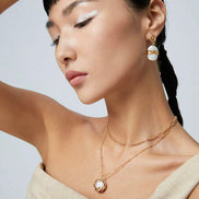 Molten Wrap Pearl Pendant Necklace