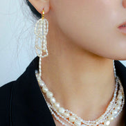 Whispering Waves Pearl Earrings